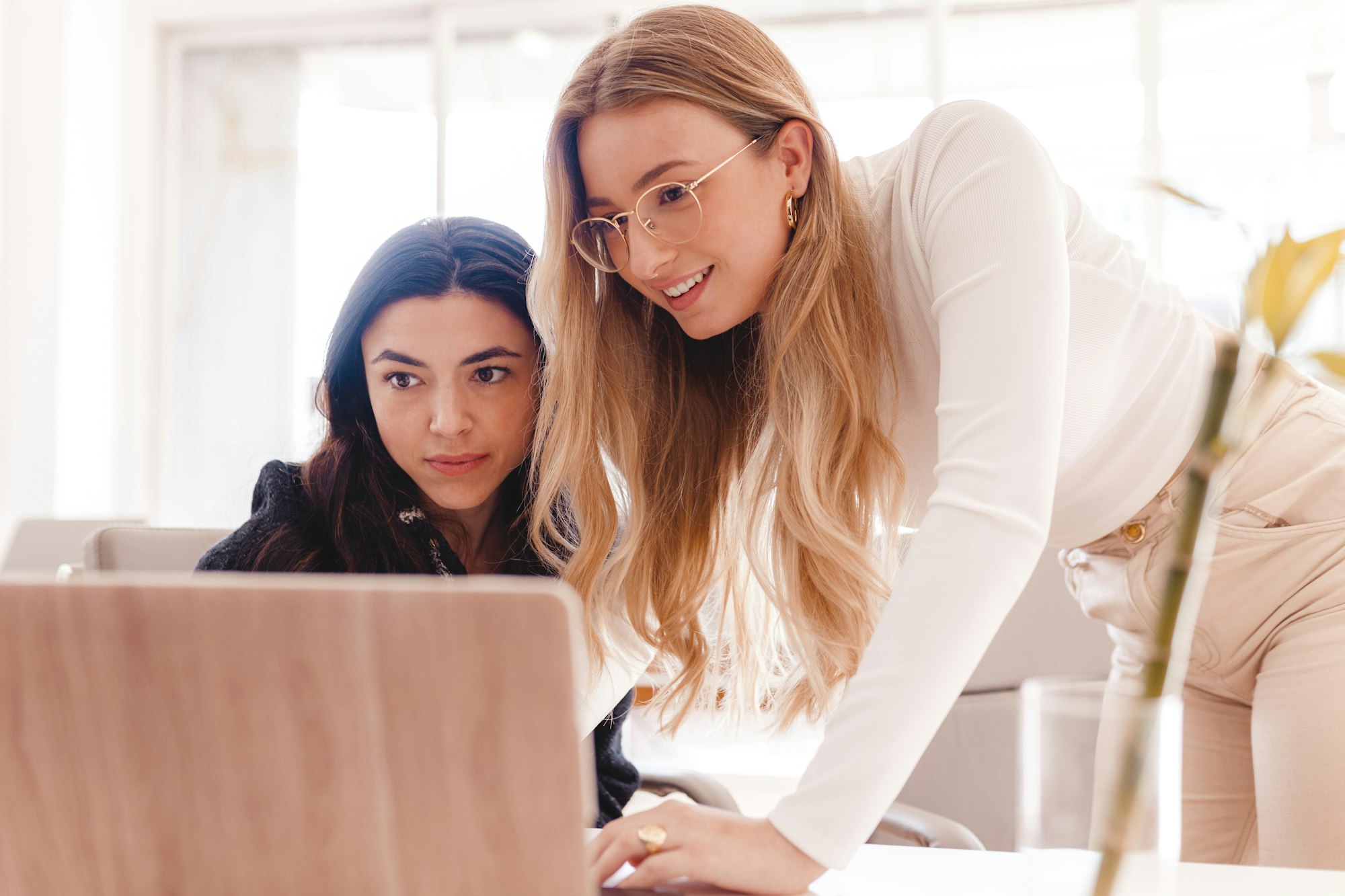 Two women working at the office
